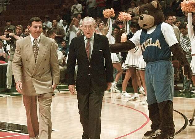 Wooden with then-UCLA coach Jim Harrick in 1995.
